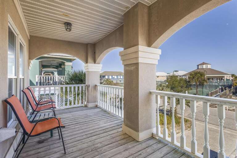 Seaside Balcony View, Breezy Balustrades Beneath A Beamed Ceiling