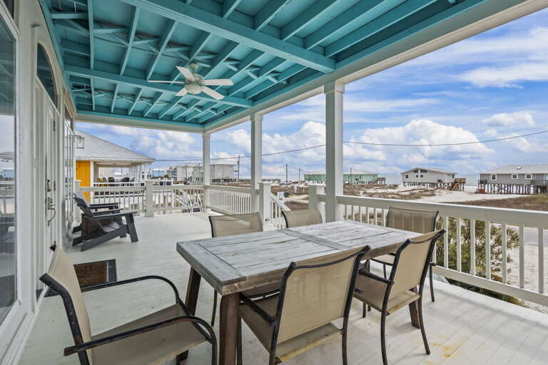 Balcony Breeze Brings Beachside Bliss, Table Set For Serene Seaside Supper