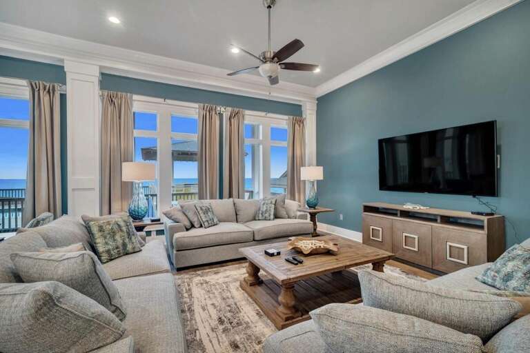 Spacious Living Area With Sleek Sofas And Smooth Sea View