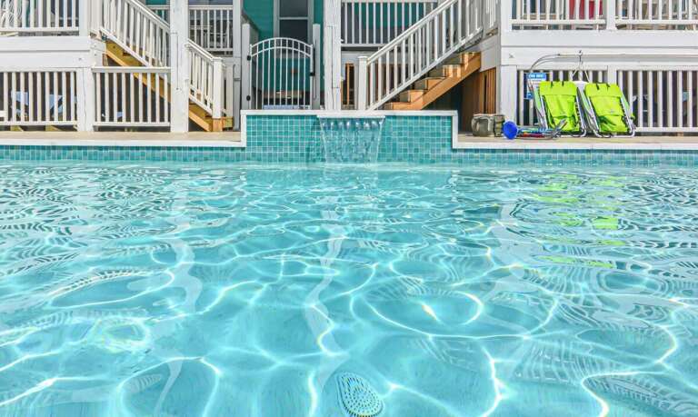 Poolside Perspective, Chairs Beside, Shimmering Surface