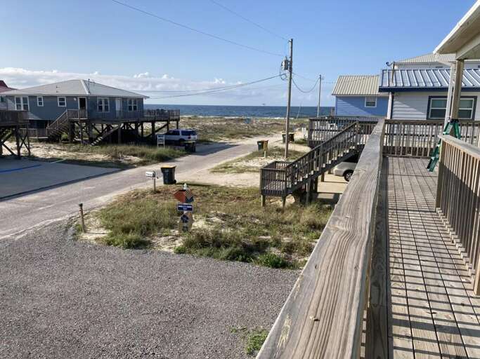 Seaside Structure Siding With Sands, Sunny Sky, Serene Street