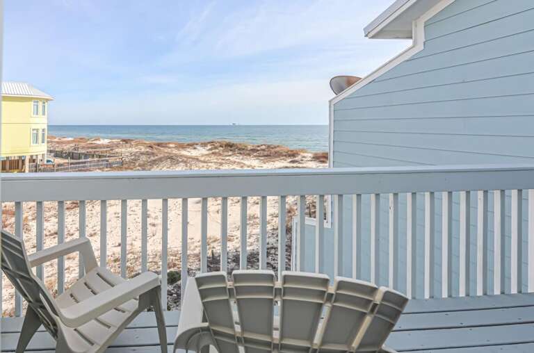 Balcony View Of Beach And Blue Sea