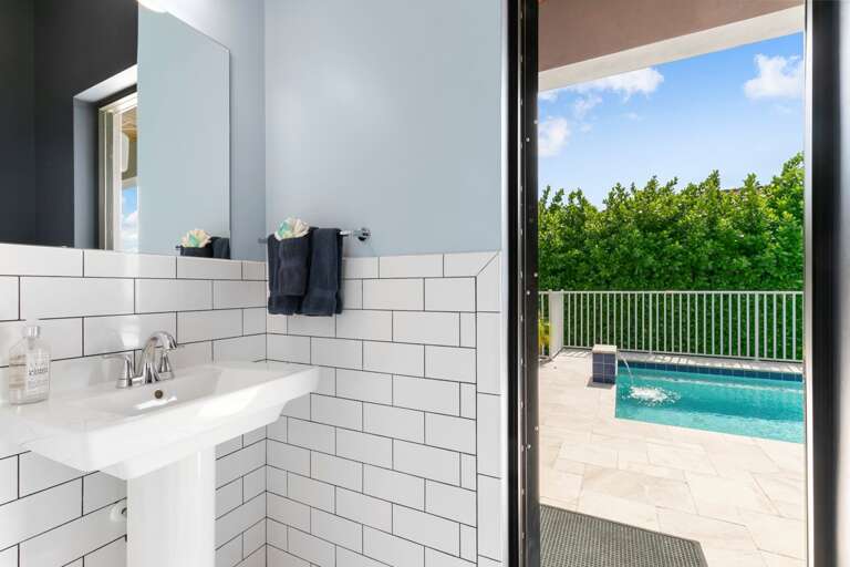 Half bath out to pool/lanai