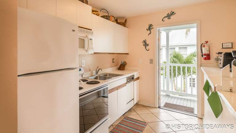 Kitchen Opens to Front Balcony Kitchen Opens to Front Balcony